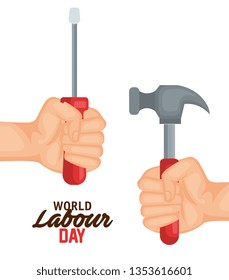 hands with screwdriver and hammer to labour day