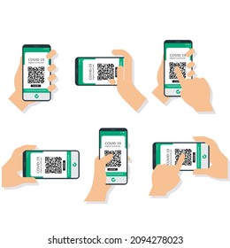 Hands in several positions holding the International Digital Certificate of vaccine for Covid-19 in a cellphone in order to travel between countries and access cultural events.