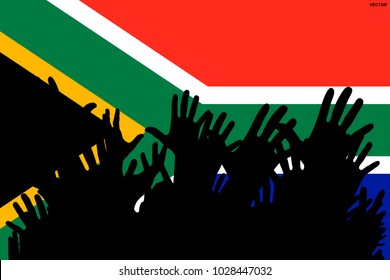 Hands up silhouettes on a South Africa flag