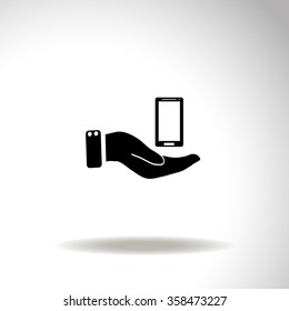 In the hands of the smartphone icon, vector illustration