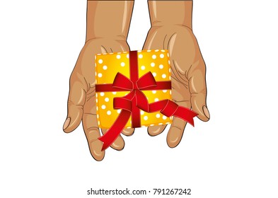 Hands stretch a gift box with a bow. View from above. Greeting card or invitation for the holiday on wooden background with confetti.