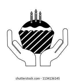 hands with sweet cupcake and candles isolated icon