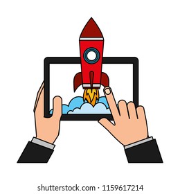 hands with tablet device and startup rocket