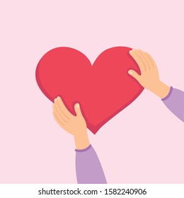 Hands take care of love, hands hold up a heart, sign of valentine day concept. - Shutterstock ID 1582240906