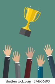 Hands throwing a trophy cup in the air. Business success concept