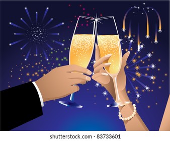 Hands toasting with fireworks A couple makes a champagne toast over a background of colorful fireworks.