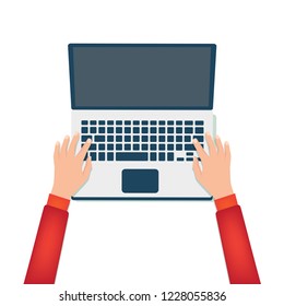 Hands typing on a laptop.