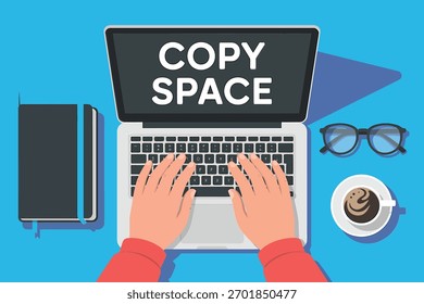 Hands typing on a laptop displaying the words copy space surrounded by a book glasses and a cup of coffee on a blue background suggesting a modern workspace ideal for advertising design projects and