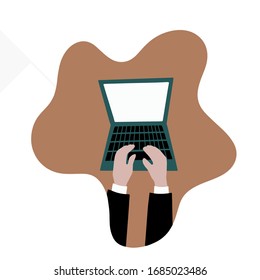 Hands typing text on the laptop keyboard. Top view of people working with computer at the work desk