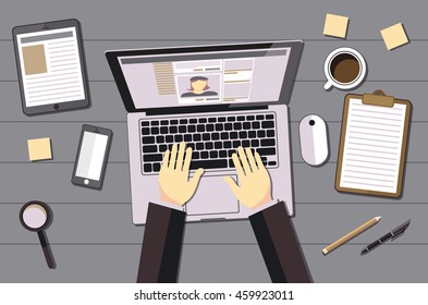 hands typing text on the laptop keyboard and using social networks for communication. Top view of people working with computer at the work desk art vector