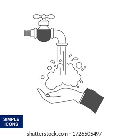 Hands under falling water out of tap. Man washes hands, hygiene.