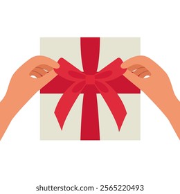 Hands untie a bow from the white ribbon on the red gift box