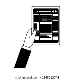 Hands using tablet to check social networks in black and white