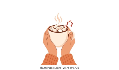 Hands in warm sweater holding mug of hot cocoa topped with marshmallows and candy cane for winter cozy vibes.