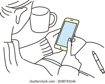 Hands of a woman operating a smartphone