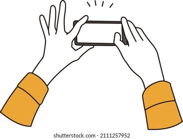 Hands of a woman taking a picture with a smartphone