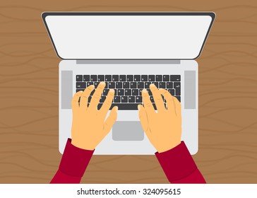 hands work on the laptop top view