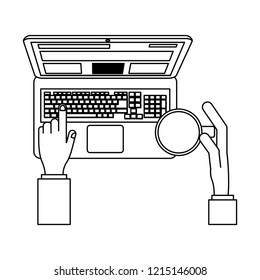 Hands working on laptop in black and white