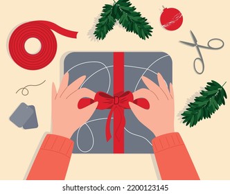 Hands wrapping a Christmas gift.  Christmas present. Top view. Flat vector illustration.