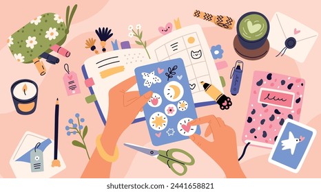 Hands write top view. Female hands stick stickers in diary. Woman taking notes. Daily planning. Event and tasks schedule. Notebook on table. Office stationery. Garish