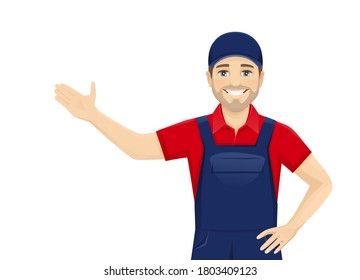 Handsame man in blue overalls presenting something isolated vector illustration