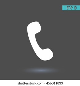 Handset vector icon. Graphic symbol for web design, logo. White glyph on a gray background. Isolated sign.