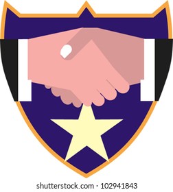 Handshake above a star inside a badge or shield image