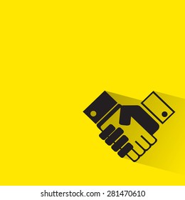 handshake icon with long shadow.

