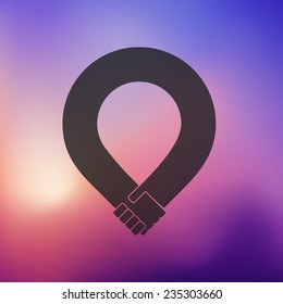 handshake icon on blurred background