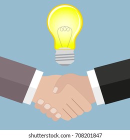 handshake light bulb on a blue background