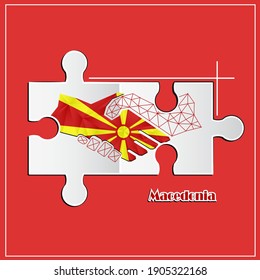 Handshake-Logo aus der Flagge Mazedoniens