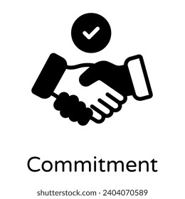 Handshake with tick showing the concept of commitment 