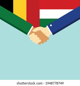 The handshake and two flags Belgium and Hungary. Flat style vector illustration.