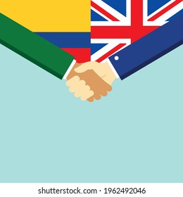 The handshake and two flags Colombia and United Kingdom. Flat style vector illustration.