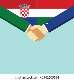 The handshake and two flags Croatia and Hungary. Flat style vector illustration.