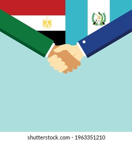 El apretón de manos y dos banderas son Egipto y Guatemala. Ilustración vectorial de estilo plano.