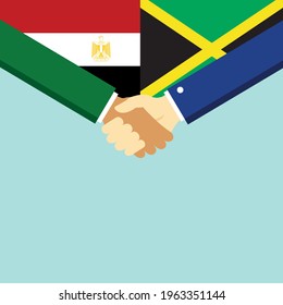 Der Handschlag und zwei Flaggen Ägypten und Jamaika. Flache Vektorgrafik.