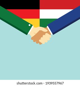 Der Handschlag und zwei Flaggen Deutsch und Ungarn. Flache Vektorgrafik.

