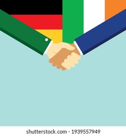 El apretón de manos y dos banderas: alemana e irlandesa. Ilustración vectorial de estilo plano.
