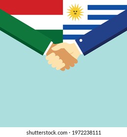 The handshake and two flags Hungary and Uruguay. Flat style vector illustration.