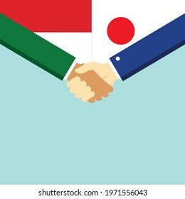 The handshake and two flags Indonesia and Japan. Flat style vector illustration.
