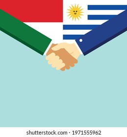 The handshake and two flags Indonesia and Uruguay. Flat style vector illustration.