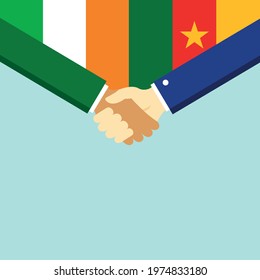 The handshake and two flags Ireland and Cameroon. Flat style vector illustration.