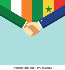 The handshake and two flags Ireland and Senegal. Flat style vector illustration.