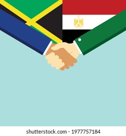 The handshake and two flags Jamaica and Egypt. Flat style vector illustration.