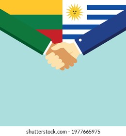 The handshake and two flags Lithuania and Uruguay. Flat style vector illustration.