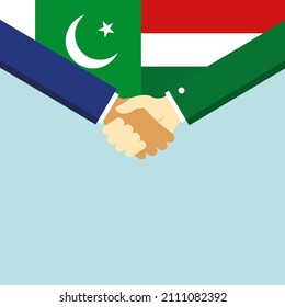 El apretón de manos y dos banderas: Pakistán y Hungría. Ilustración