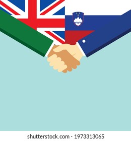 The handshake and two flags United Kingdom and Slovenia. Flat style vector illustration.
