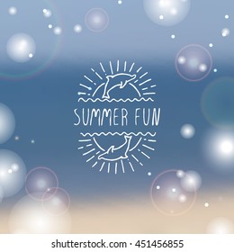 Hand-sketched summer element with dolphin and sun on blurred background. Text - Summer fun