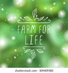 Hand-sketched typographic element. Farm for life  - product label on blurred background. Suitable for ads, signboards, packaging and identity and web designs.